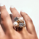 Princess ring with white stone and white pearl on model