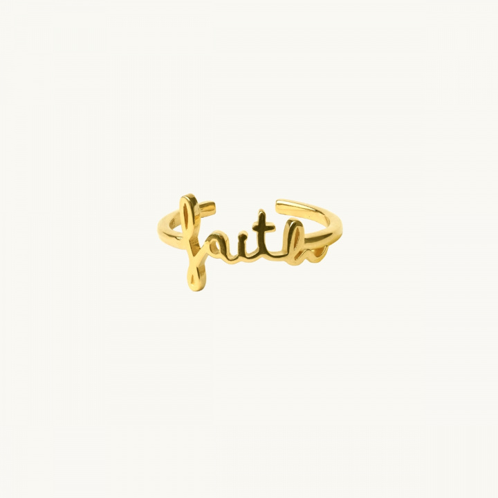 Ring in gold with the word faith