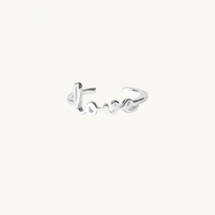 Silver ring with the word love