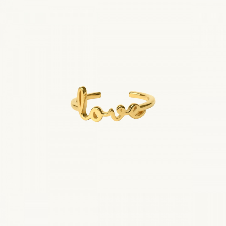 Ring in gold with the word love